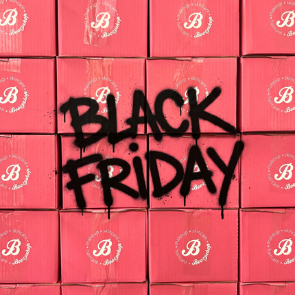 Roze Boozyshop-logo met gouden confetti voor de Black Friday deals