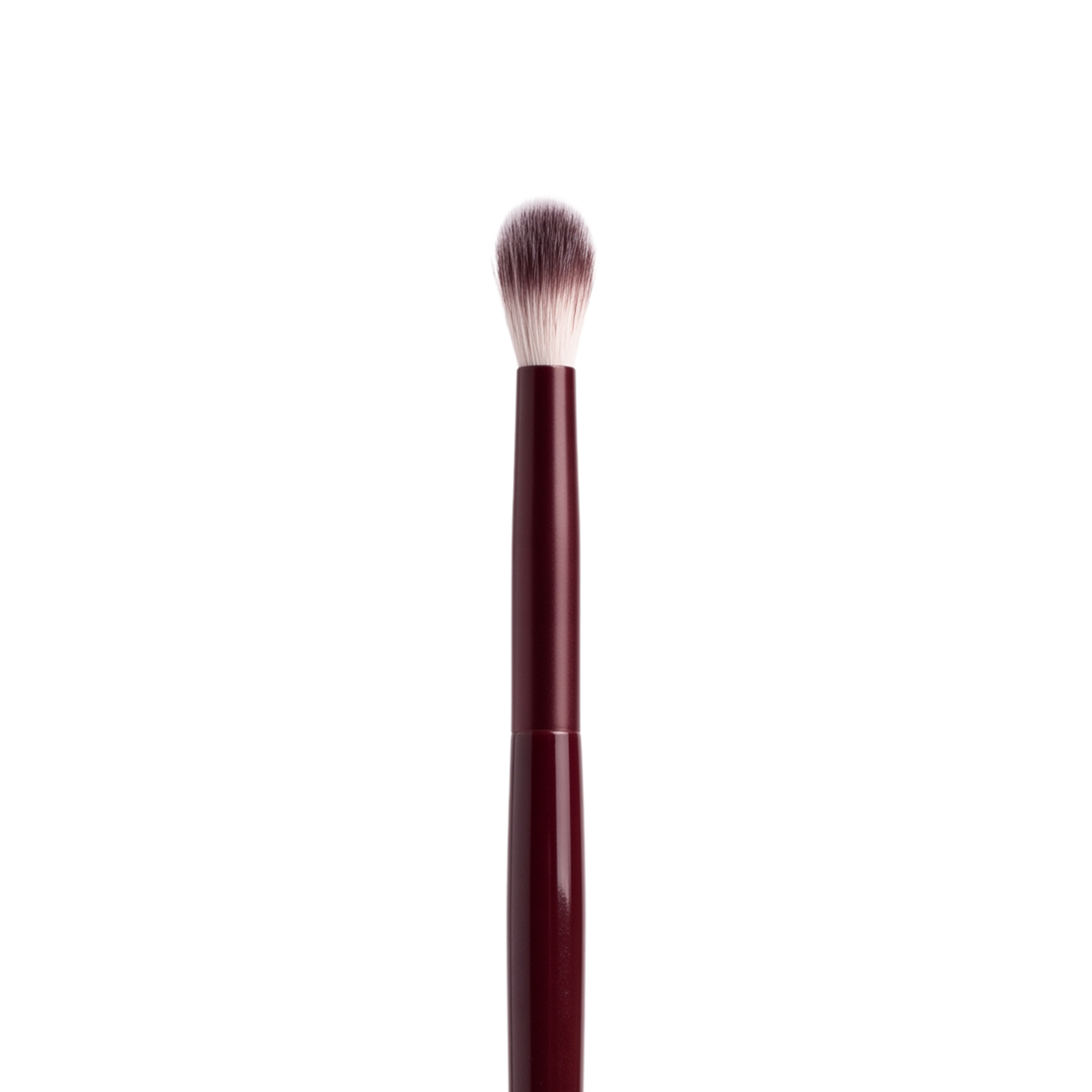 Boozyshop Flawless Defined Crease Brush, close-up of the brush head on a white background